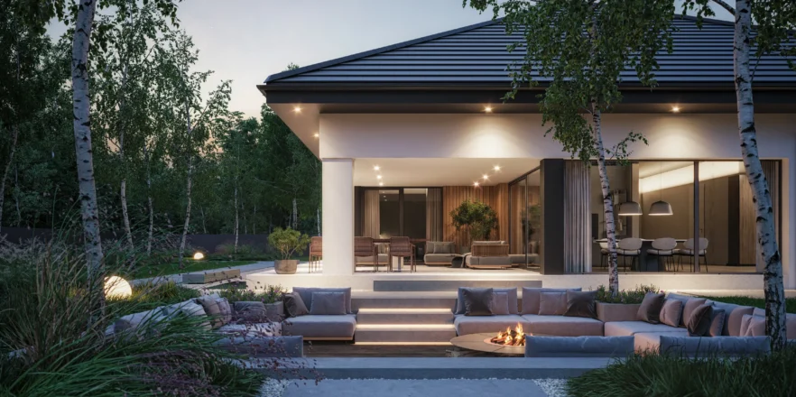 Strefa relaksu: taras i miejsce na ognisko przy parterowym domu Modern House NewHouse 770w1