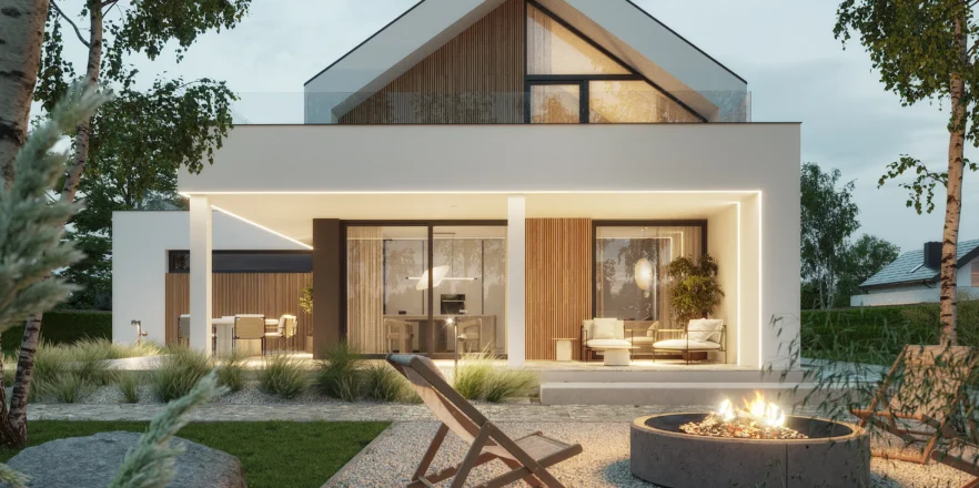 Widok na elewację ogrodową domu z poddaszem i zadaszonym tarasem oświetlonym listwami LED NewHouse 749 G2