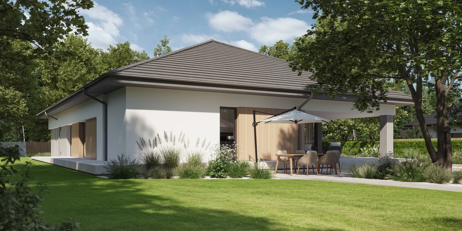 Widok od ogrodu na strefę wypoczynkową przy parterowym domu projekt NewHouse 767 w2